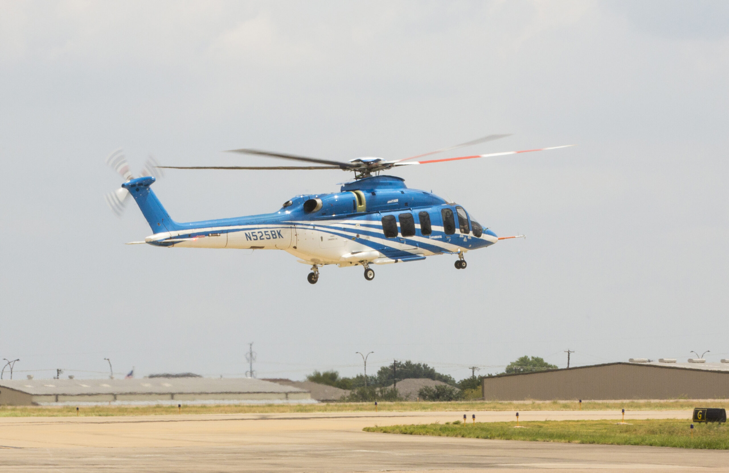 The pilot Michael Hougaard hovers the helicopter, before lowering the nose and increasing the speed. Photo: Bell